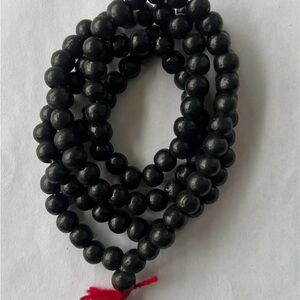 Black Beaded Necklace with Red Tassel